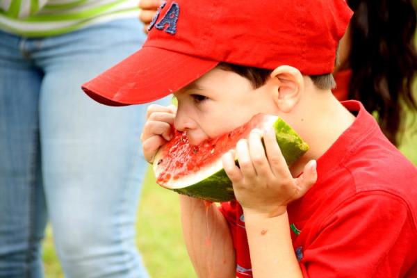 Watermelon Festival Kid Eating
